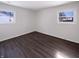 Comfortable bedroom featuring hardwood floors, bright natural light, and simple neutral decor at 639 S Alpha Ave, Brownsburg, IN 46112