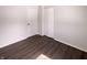Bedroom featuring closet, wood-look floors, and natural light at 639 S Alpha Ave, Brownsburg, IN 46112