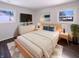 Comfortable bedroom with a cozy bed, neutral decor, and modern fixtures at 639 S Alpha Ave, Brownsburg, IN 46112