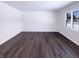 Bright open living room with beautiful hardwood floors and lots of natural light at 639 S Alpha Ave, Brownsburg, IN 46112