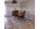 Dining room features a wood table with four chairs and decorative lighting fixture at 7152 Old Morgantown Rd, Martinsville, IN 46151