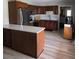 Kitchen features stainless steel appliances, shaker cabinets and a kitchen island at 7152 Old Morgantown Rd, Martinsville, IN 46151