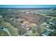 High-angle view presenting the home, barn, and land, with trees and roads visible in the surrounding area at 724 E 199Th St, Westfield, IN 46074