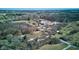 Aerial shot of the property, showcasing its buildings, greenery, and neighborhood setting at 724 E 199Th St, Westfield, IN 46074