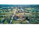 Aerial view that includes the home and barn set against a landscape with a road nearby at 724 E 199Th St, Westfield, IN 46074