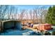 Backyard view of the property, featuring a variety of outbuildings and vehicles at 724 E 199Th St, Westfield, IN 46074