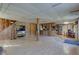 Open basement layout with dining area, wooden accents, and a walkout exterior at 724 E 199Th St, Westfield, IN 46074