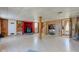 Spacious basement area with a wooden accent wall, fireplace, and a walk-out door at 724 E 199Th St, Westfield, IN 46074