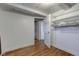 Bedroom with white walls, wood floors, and white closet with wire shelving at 724 E 199Th St, Westfield, IN 46074