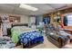 Bedroom with a bed, chair, washer and dryer, and decorative items at 724 E 199Th St, Westfield, IN 46074