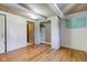 Bedroom with wood floors, closet and two doorways at 724 E 199Th St, Westfield, IN 46074