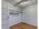 This white closet has wire shelving, a door, and wood floors at 724 E 199Th St, Westfield, IN 46074