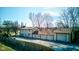 Expansive exterior with a long driveway leading to a three-car garage at 724 E 199Th St, Westfield, IN 46074