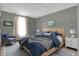 Serene bedroom featuring a queen bed, calming colors, and stylish decor at 7344 Monon Cir, Indianapolis, IN 46256