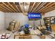 Unfinished basement with concrete walls, open ceiling rafters, and a Yamaha banner displayed at 7357 Windridge Way, Brownsburg, IN 46112