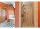 Bathroom featuring a tiled shower, tiled tub, and bright lighting at 7357 Windridge Way, Brownsburg, IN 46112