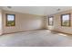 Spacious bedroom with large windows provides natural light and a calm atmosphere at 7357 Windridge Way, Brownsburg, IN 46112