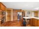 Kitchen with stainless steel appliances, wooden cabinets, and a built in oven and microwave at 7357 Windridge Way, Brownsburg, IN 46112
