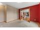 Cozy office space with wood floors and view into the home's main foyer at 7357 Windridge Way, Brownsburg, IN 46112