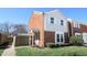 Charming two-story home featuring brick and siding accents, with manicured lawn and inviting front entrance at 7438 Melanie Ln # 13, Indianapolis, IN 46217