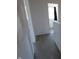 Hallway includes carpeting and a door at 7438 Melanie Ln # 13, Indianapolis, IN 46217