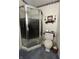 Bathroom with walk in shower and standard toilet at 7632 S Sherman Dr, Indianapolis, IN 46237