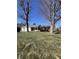 Lovely single-story brick home featuring an attached garage and a neatly kept front lawn at 7632 S Sherman Dr, Indianapolis, IN 46237