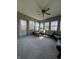 Bright sunroom featuring neutral decor and multiple windows allowing ample natural light at 7632 S Sherman Dr, Indianapolis, IN 46237