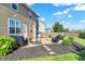 Inviting backyard with a paver patio, seating, a fire pit, and manicured landscaping for outdoor enjoyment at 7710 Eagle Crescent Dr, Zionsville, IN 46077