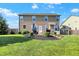 Spacious backyard features a cozy patio and lush lawn, perfect for outdoor activities and relaxation at 7710 Eagle Crescent Dr, Zionsville, IN 46077