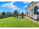 Well-manicured backyard with a cozy patio area, ideal for outdoor gatherings and leisure at 7710 Eagle Crescent Dr, Zionsville, IN 46077