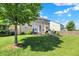 Expansive backyard with a well-maintained lawn and a charming patio area for outdoor enjoyment at 7710 Eagle Crescent Dr, Zionsville, IN 46077