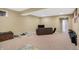 Finished basement featuring neutral walls, plush carpet, and ample space for entertainment or recreation at 7710 Eagle Crescent Dr, Zionsville, IN 46077