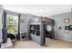Stylish bedroom featuring a lofted bed with a built in desk and a large window at 7710 Eagle Crescent Dr, Zionsville, IN 46077