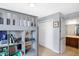 Stylish bedroom featuring a lofted bed with a built in desk and an ensuite bathroom at 7710 Eagle Crescent Dr, Zionsville, IN 46077