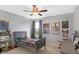 Comfortable bedroom featuring neutral walls, carpet floors, ceiling fan and natural light at 7710 Eagle Crescent Dr, Zionsville, IN 46077