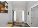 Bright and welcoming foyer with natural light and modern decor, showcasing a clean and inviting space at 7710 Eagle Crescent Dr, Zionsville, IN 46077