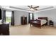 Spacious primary bedroom with tray ceilings and large windows offering plenty of natural light at 7710 Eagle Crescent Dr, Zionsville, IN 46077