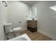 Bathroom showcasing a modern vanity and a toilet at 1011 W 28Th St, Indianapolis, IN 46208