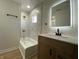 Updated bathroom with new fixtures and tiled shower at 1011 W 28Th St, Indianapolis, IN 46208