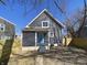 Charming house with attractive siding and a bright blue front door at 1011 W 28Th St, Indianapolis, IN 46208