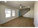 An open-concept living room with natural light and a staircase at 1011 W 28Th St, Indianapolis, IN 46208