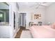Bedroom with views into an ensuite bathroom featuring a modern vanity at 1014 Jackson St, Columbus, IN 47201