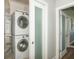 A stacked washer and dryer in the laundry room at 1014 Jackson St, Columbus, IN 47201