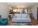 Comfortable living area with hardwood floors, recessed lighting, and views of the kitchen at 1014 Jackson St, Columbus, IN 47201