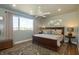 Spacious bedroom with a large window providing natural light, ceiling fan and decorative rug at 1014 Jackson St, Columbus, IN 47201