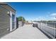 An outdoor rooftop deck with chairs and a table for entertaining at 1014 Jackson St, Columbus, IN 47201