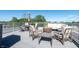 Rooftop deck with patio seating and table with umbrella at 1014 Jackson St, Columbus, IN 47201
