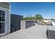 The spacious rooftop deck includes an outdoor kitchen prep area, seating and lounge areas, plus a hot tub at 1014 Jackson St, Columbus, IN 47201