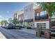 Street view of modern townhomes with brick and stucco exteriors and well-maintained landscaping at 1014 Jackson St, Columbus, IN 47201
